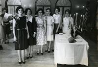 black & white photo of smiling members of the Alpha Zeta chapter standing proud
